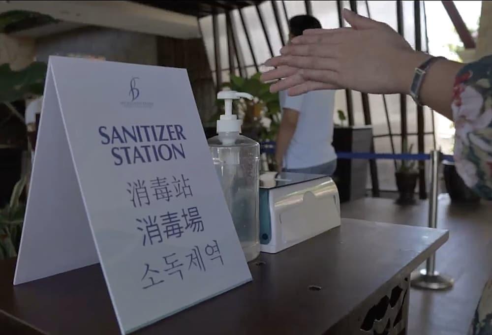 The Bellevue Resort Panglao Kültér fotó A hand sanitizer station at a hotel in Seoul, South Korea